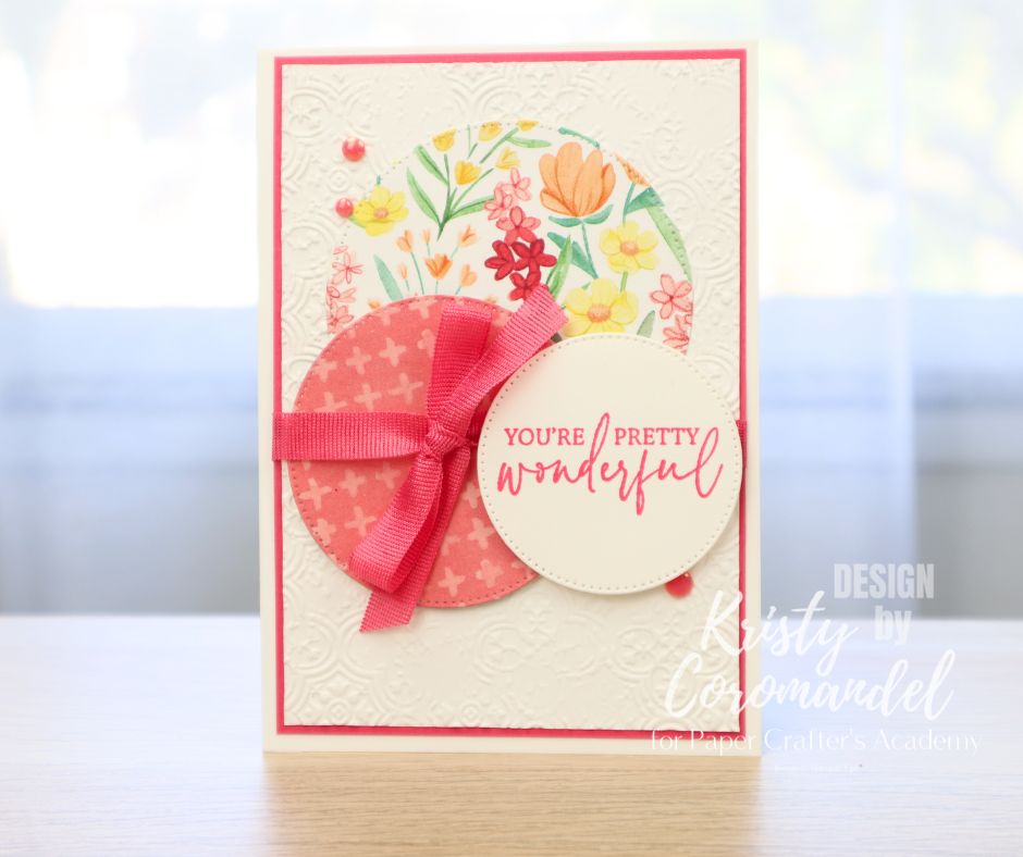 Pink and floral patterned paper circles with textured background