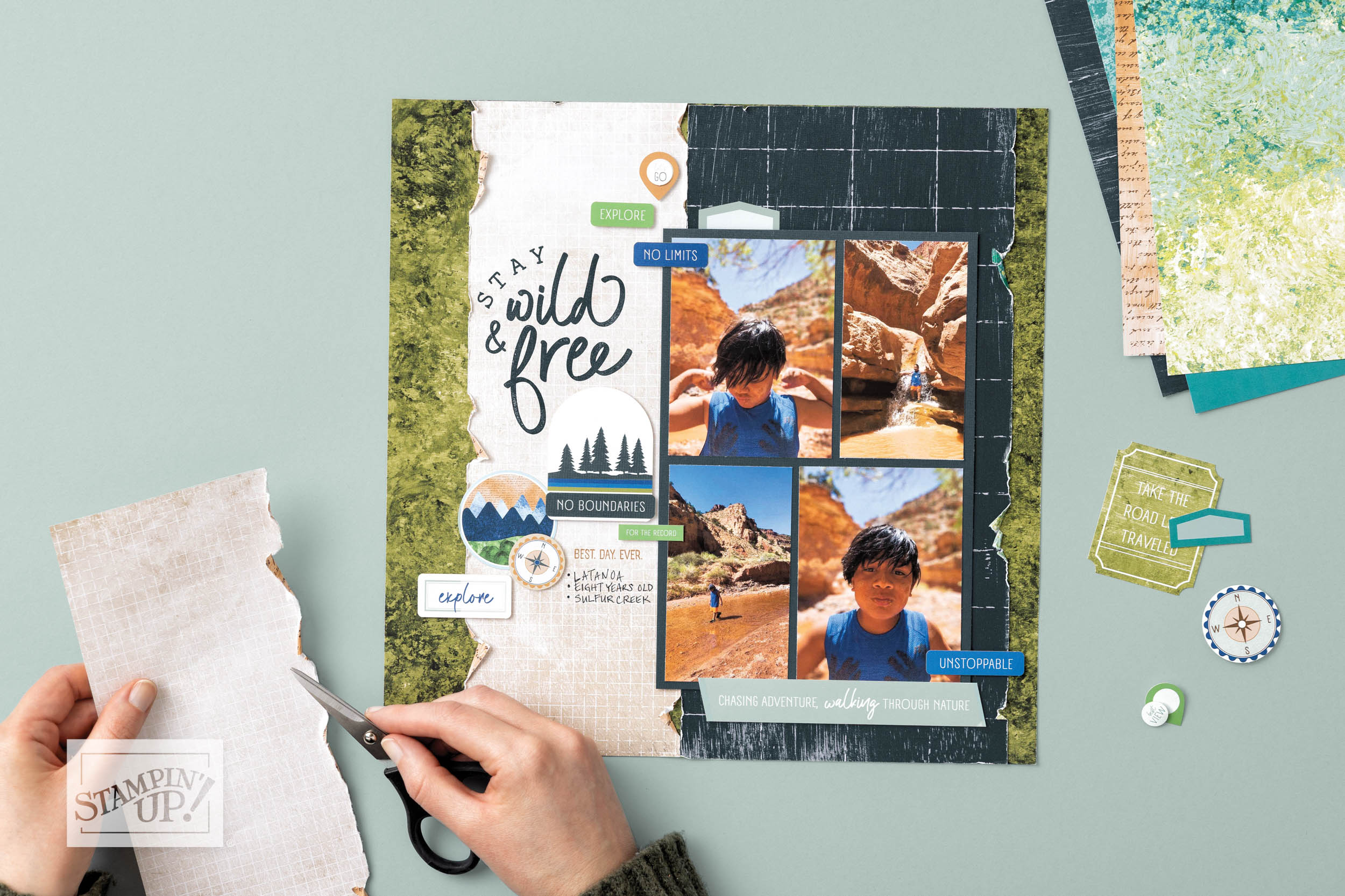 “Scrapbooking Workshop Emerald layout featuring outdoor adventure photos and layered embellishments.”