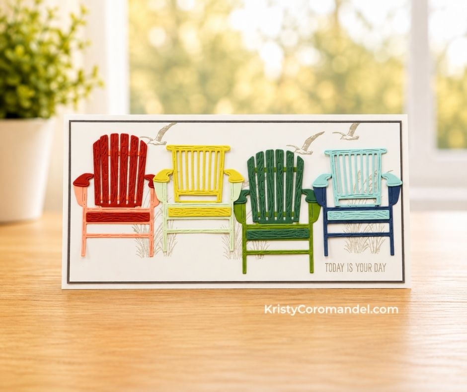 Handmade slimline card featuring four die-cut Adirondack chairs in red, yellow, green and blue with softly stamped grasses and seagulls, made with the Stampin' Up! Relaxing Waterside Bundle.
