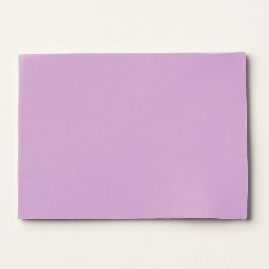 Purple Simply Shammy stamp cleaning mat used to quickly remove ink from clear, photopolymer, and rubber stamps without chemicals or cleaning solution.